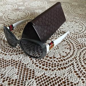 Gucci sunglasses! White and grey with logo.